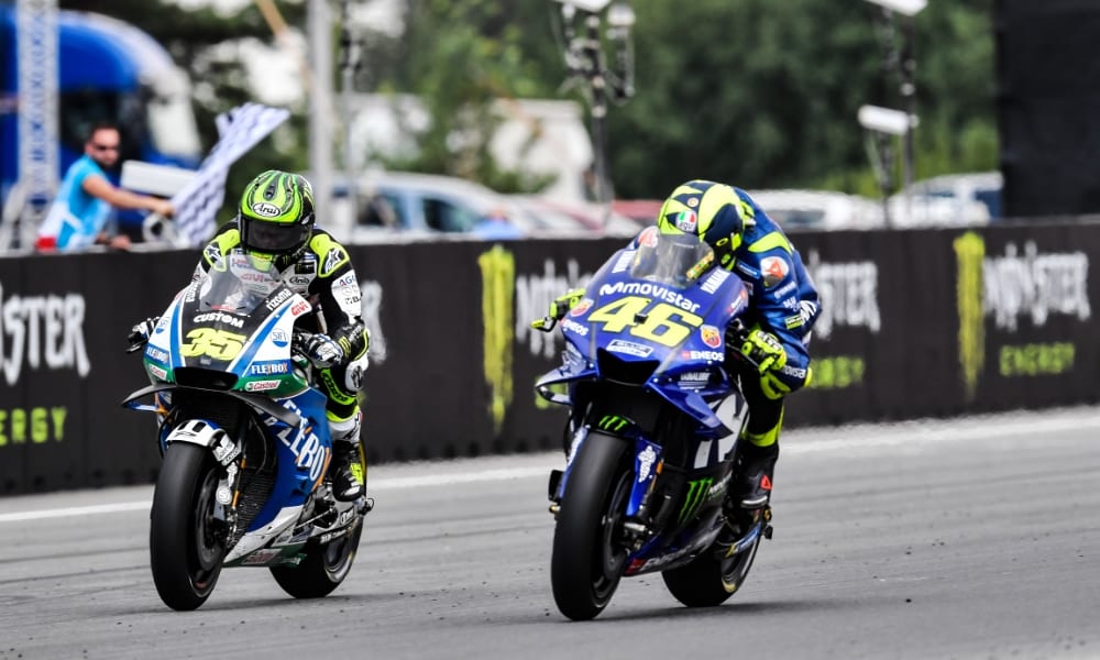 Valentino Rossi (#46) pips Brit Cal Crutchlow to the line for 4th place (MotoGP)