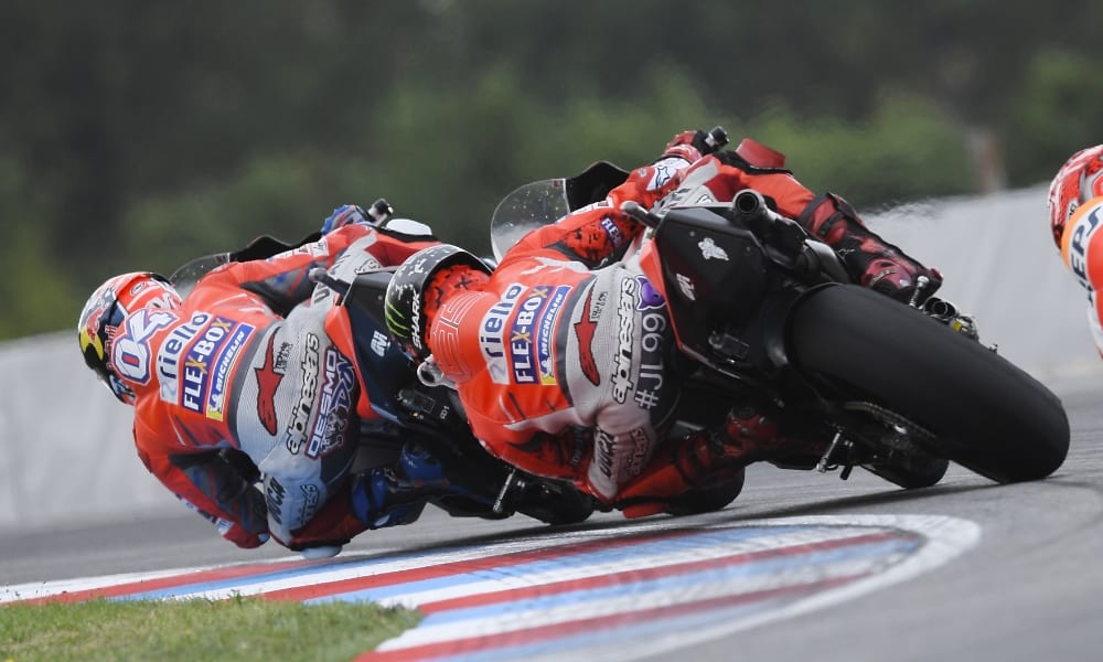 Knees and elbows down: Dovizioso and Lorenzo riding on the limit at Brno (Pic: Ducati)
