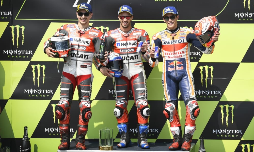 The top three: Andrea Dovizioso (centre), flanked by Jorge Lorenzo (left) and Marc Marquez (Pic: MotoGP)